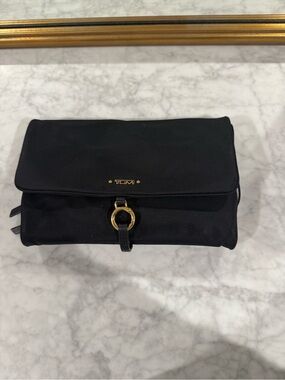 Tumi Black Fold-Over Jewelry Case with Gold Hardware